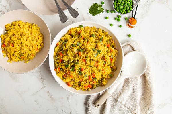 Toasted Yellow Rice And Green Peas
